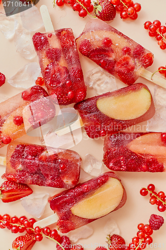 Image of Homemade frozen various red berries natural juice popsicles - paletas - ice pops