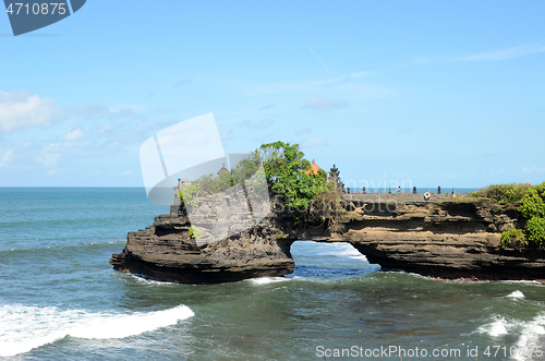 Image of Pura Batu Bolong in the rock in Bali, Indonesia