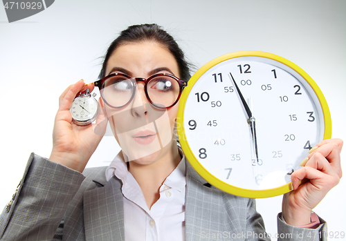 Image of Young woman can\'t wait to go home from the nasty office