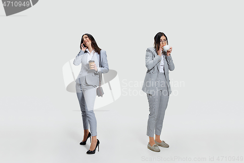 Image of Young woman comes to work rumpled and untidy