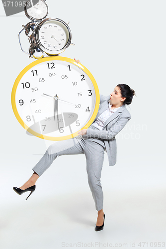 Image of Young woman can\'t organize her worktime