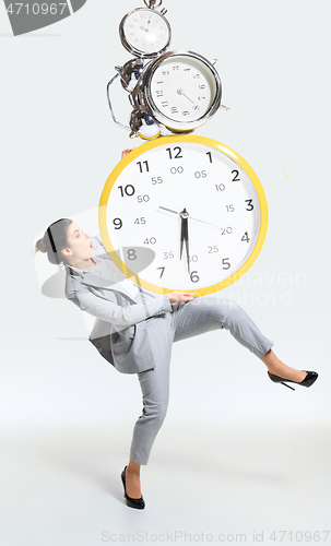 Image of Young woman can\'t organize her worktime