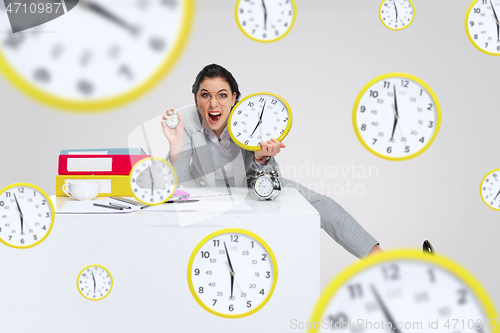 Image of Young woman can\'t wait to go home from the nasty office