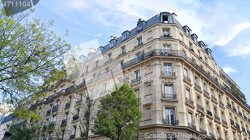 Image of Facade of typical building with attic in Paris