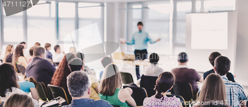 Image of Speaker Giving a Talk at Business Meeting.