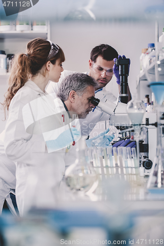 Image of Health care researchers working in scientific laboratory.