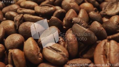 Image of Roasted coffee beans un camera motion