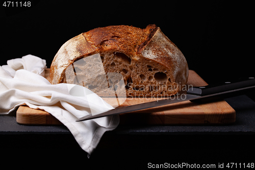 Image of Artisan sourdough bread. on the black background. 