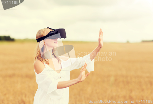 Image of woman in virtual reality headset on cereal field