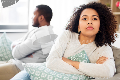 Image of unhappy couple having argument at home