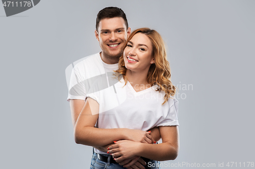 Image of portrait of happy couple in white t-shirts