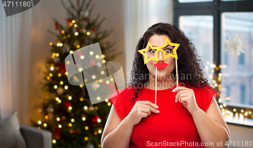 Image of funny woman with star shaped glasses and red lips