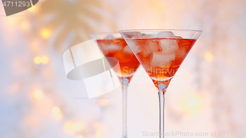 Image of two glasses of red summer cocktail