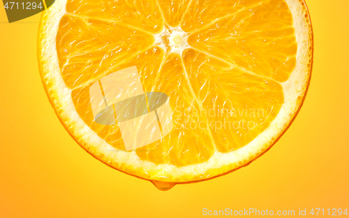 Image of slice of juicy orange fruit