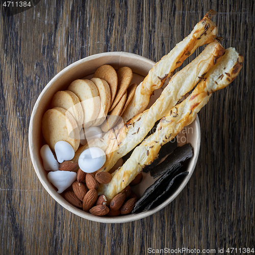 Image of various cookies in cardboard cup