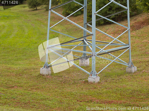 Image of Lower part of a large electric support on a nature background