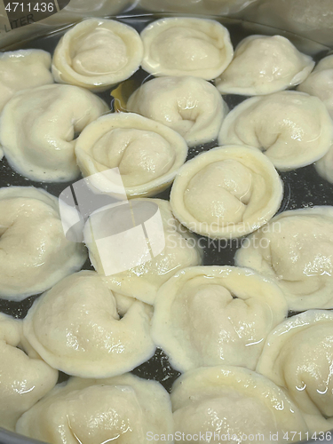 Image of Cooking dumplings in boiling water