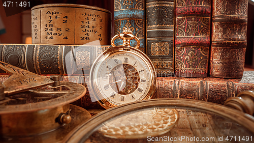 Image of Vintage pocket watch. Vintage background Concept of time history