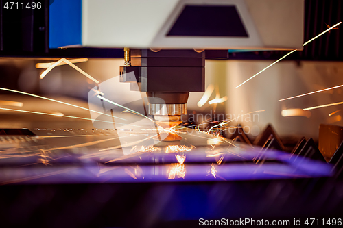 Image of CNC Laser cutting of metal, modern industrial technology.