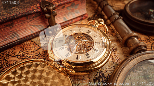 Image of Vintage pocket watch. Vintage background Concept of time history