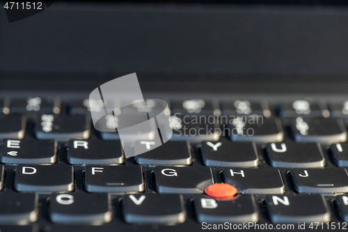 Image of Macro shot of laptop with black keyboard