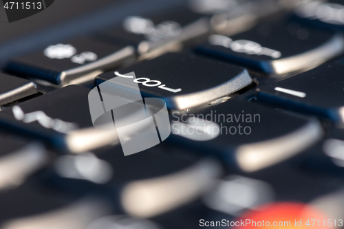 Image of Macro shot of black keyboard focus on 8 key