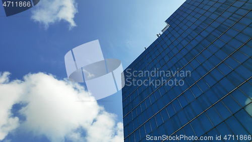 Image of Modern office building and blue sky