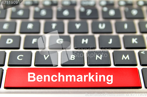 Image of Benchmarking word on computer space bar