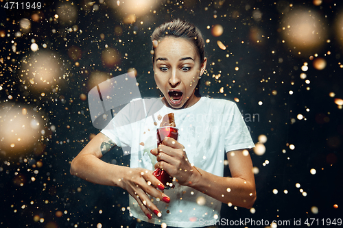 Image of Woman drinking a cola