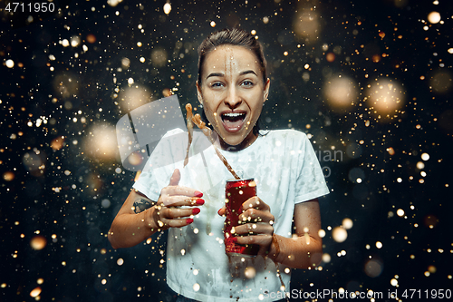 Image of Woman drinking a cola