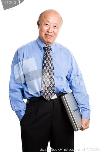 Image of Senior asian businessman and laptop