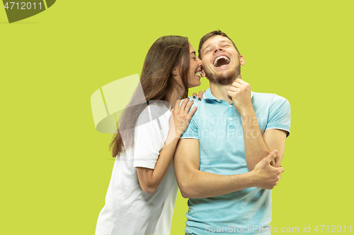 Image of Beautiful couple isolated on green studio background