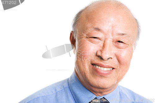 Image of Smiling senior asian businessman