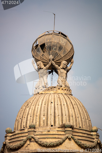 Image of four atlases at Cairo Egypt