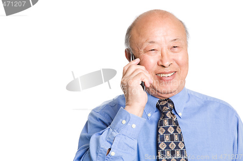Image of Senior asian businessman on the phone