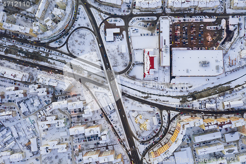 Image of City road junctions on the bridge, above winter scene