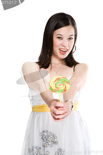 Image of Beautiful asian woman with lollipop