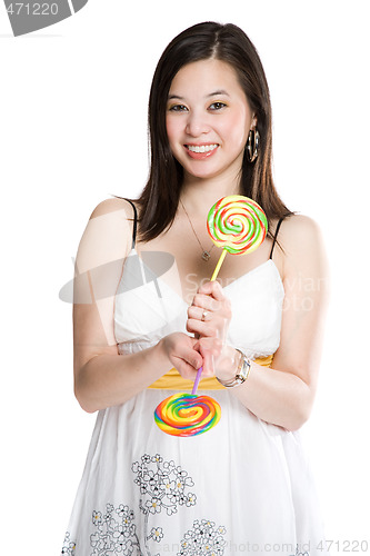 Image of Beautiful asian woman and lollipops