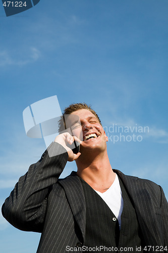 Image of Caucasian businessman on the phone