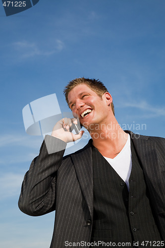 Image of Caucasian businessman on the phone