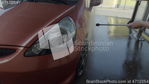 Image of Eashing dirty car closeup footage