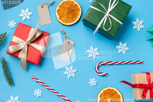 Image of christmas gifts, tags and decorations