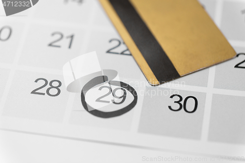 Image of black friday sale date on calendar and credit card