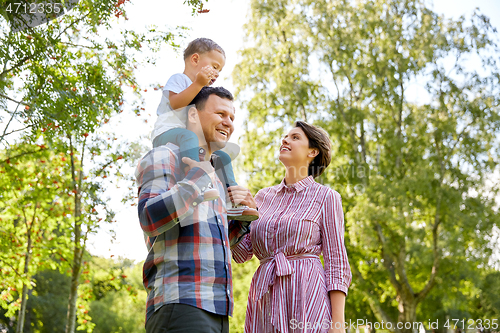 Image of happy family having fun at summer park