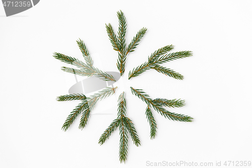 Image of christmas snowflake shape made of fir branches