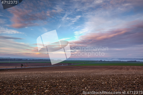 Image of Autumn morning landscape over the city of Louny. 