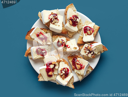 Image of plate of toasted bread with brie