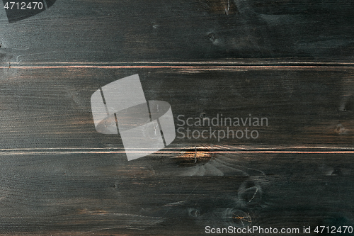 Image of dark aged wood background