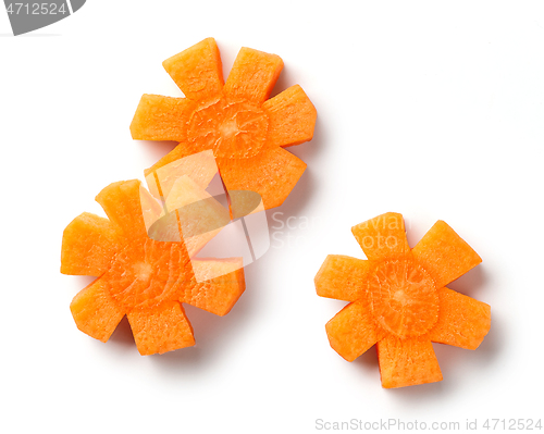 Image of fresh raw flower shaped carrot slices