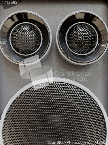 Image of Musical speaker with protective grill